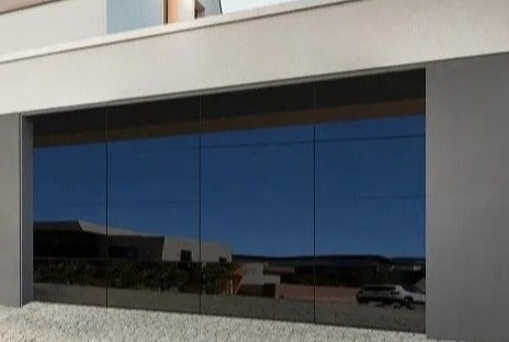 Ultra-modern black-tinted glass garage door on a sleek, contemporary house, reflecting the surrounding environment, showcasing a minimalist and high-end design